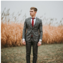 Person wearing a suit.